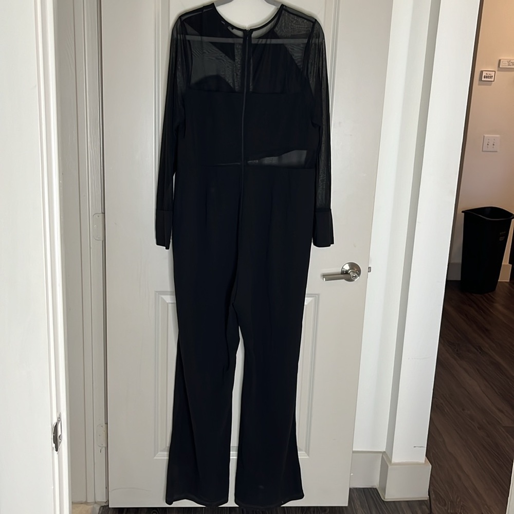 Ladies Zip Up Jumpsuit With A Hint Of Sheer. - image 5